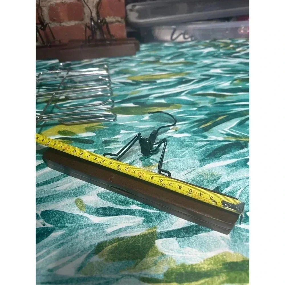 6 Wooden, 1 Metal Clothing Hangers
